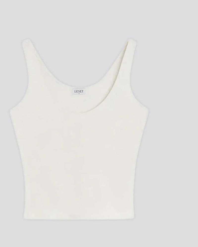Front of a model wearing a size L Rio Fitted Scoop Neck Tank Top in Natural in Natural by LESET. | dia_product_style_image_id:346046